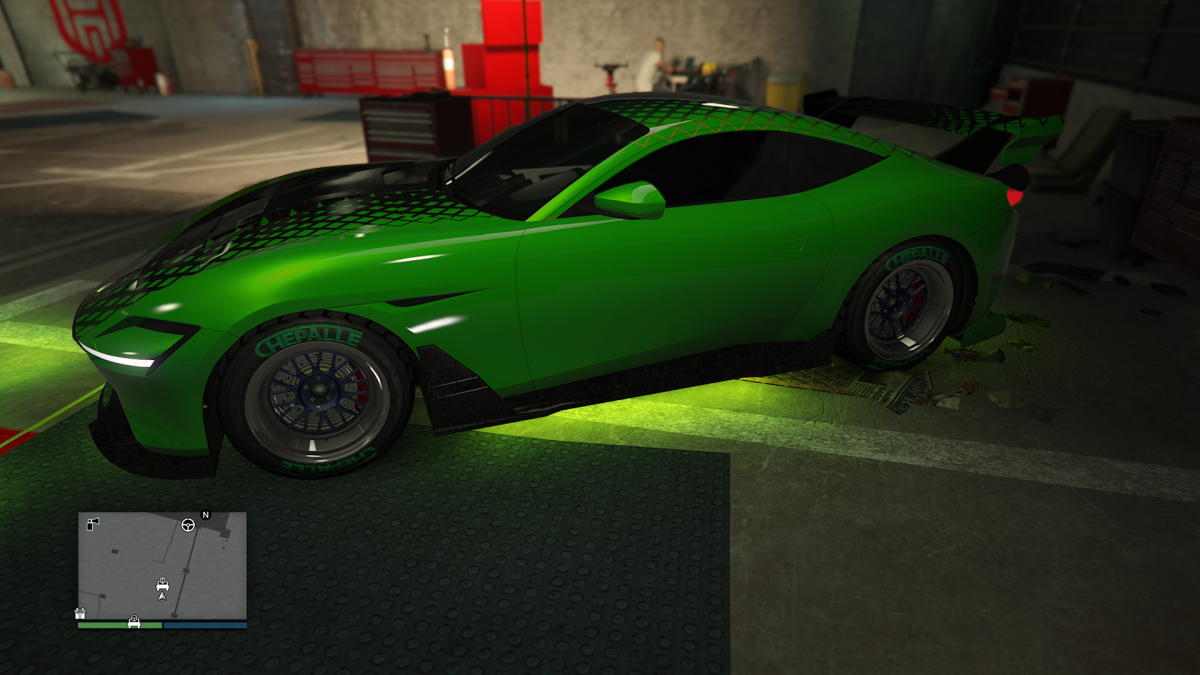 Grotti Itali GTO Stinger TT in a metallic green paint job with a black hood and roof that features a subtle black snakeskin or honeycomb pattern livery, parked in the LS Car Meet.
